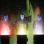 Photo of members of the Blue Man Group.