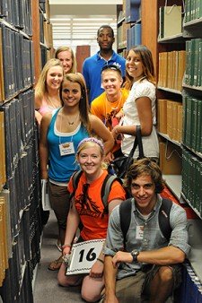 Photo of student orientation group in library.