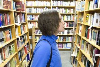 Photo of student in bookstore.