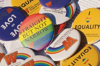 Photo of buttons in support of gay rights.