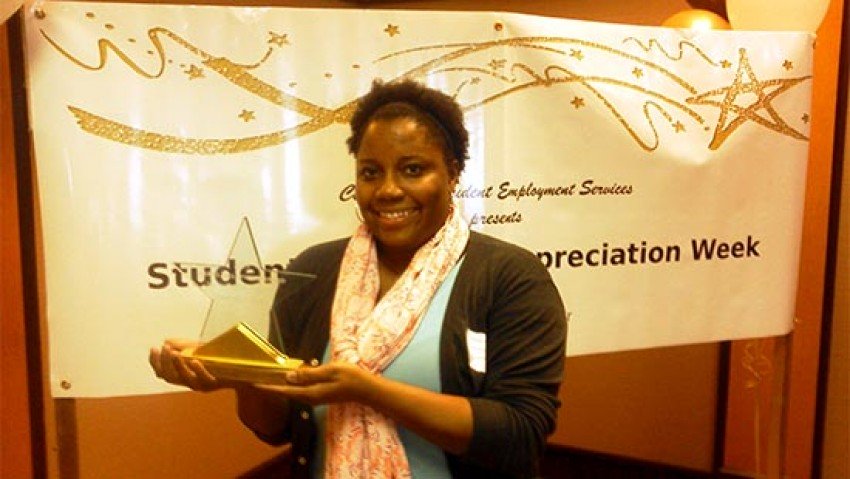 Photo of Demetria Jones with her award.