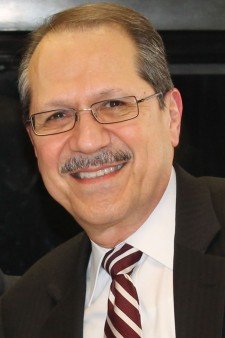 Head-and-shoulders photo of Juan R. Olivarez.