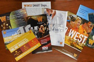 Photo of University brochures and other printed materials.