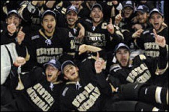 Photo of Bronco hockey team after winning the CCHA Tournament.