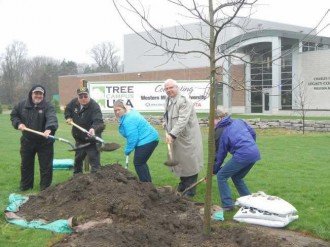Planting tree in honor of Arbor Day