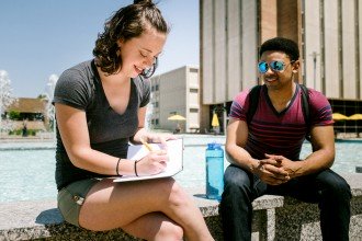 Photo of two WMU students studying.