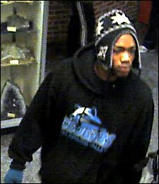 Photo of suspect in armed robberies.
